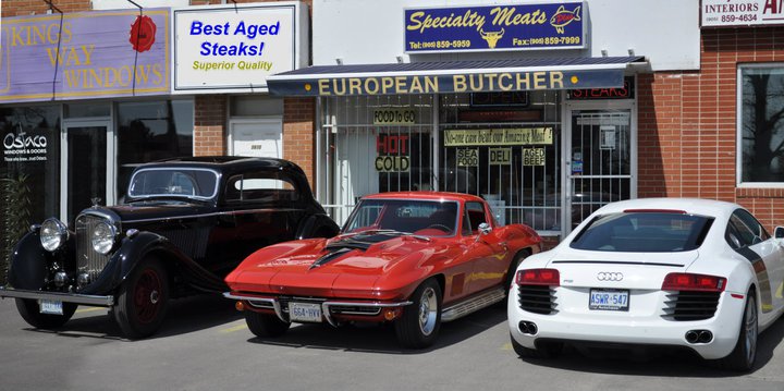 Specialty Meats Plus store front and cars
